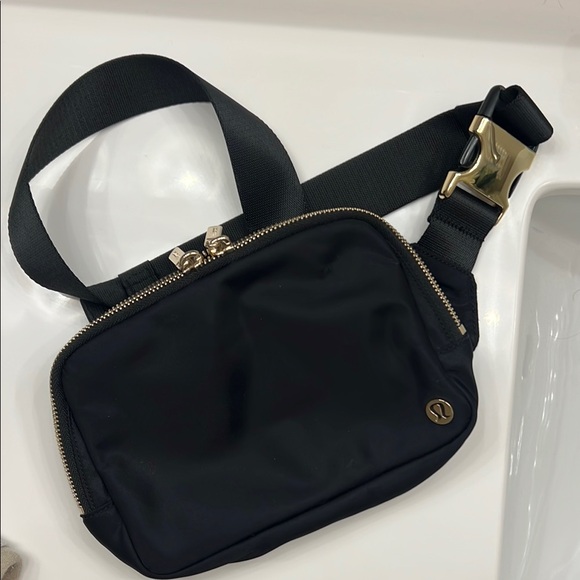 Lululemon Athletica Black and Gold Belt Bag Sleek Design - Picture 5 of 6